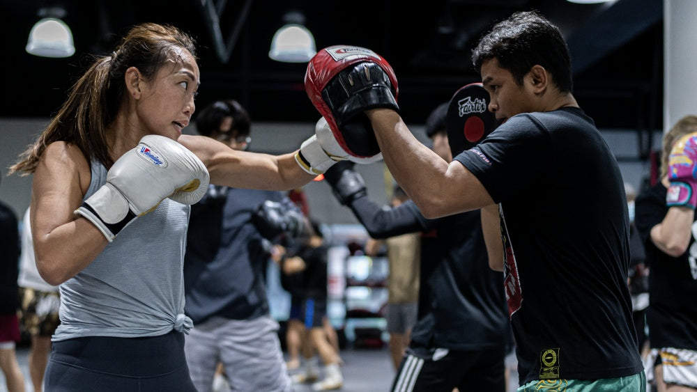 Womens Boxing Gloves and Focus Pads: Safety Tips and Proper Usage